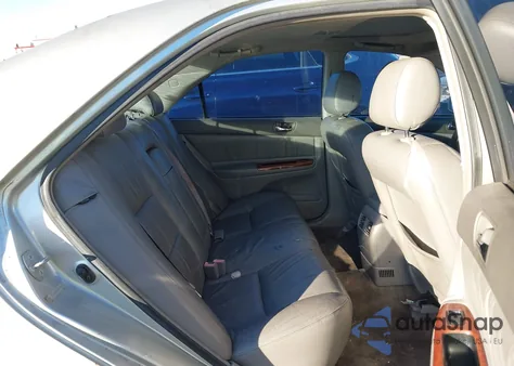 2002 Toyota Camry Xle V6 z USA, uszkodzony, nr VIN JTDBF30K020049275